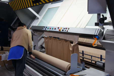 Machine for visual quality control of fabric before using it in the production of clothingの写真素材