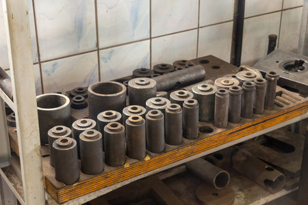 Set of different instruments on shelves in big workshop. A set of tools for repair and adjust the...