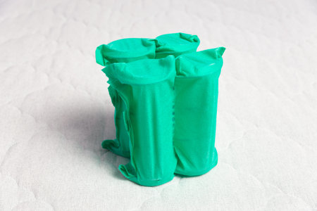 Independent spring block packed in green spunbond. Bonding layers of springs. Furniture manufacture....