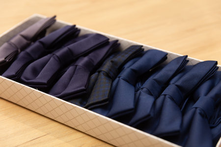 Showcase in a store with beautiful multi-colored bow ties. Many bright colorful beautiful bow ties...