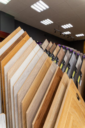 Laminate background. Samples of laminate or parquet with a pattern and wood texture for flooring and interior design. Production of wooden floorsの写真素材