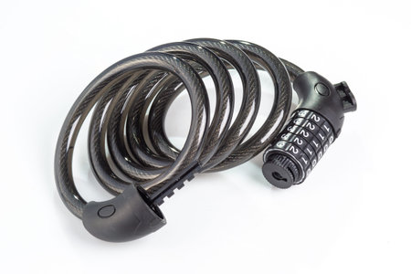 A secure bike lock featuring a sturdy cable and combination mechanism, perfect for urban cyclists seeking safety and convenience for their bicycles.の写真素材
