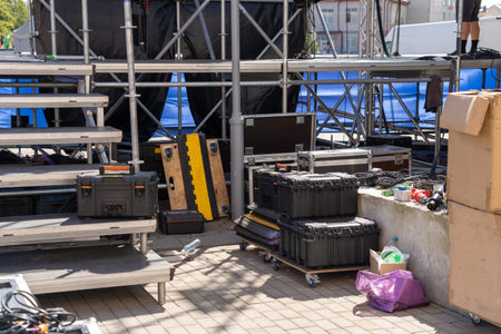 Stage equipment before the concert. Boxes with concert equipment: speakers, lighting, amplifiers, LED panels and cables.の写真素材