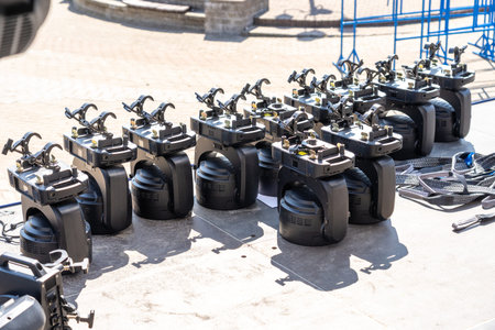 Concert lighting equipment awaits installation on stage, showcasing the vibrant world of live music...