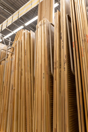 Shelf in a construction supermarket with louvered boards. They are used for manufacturing doors, windows and partitions.の写真素材