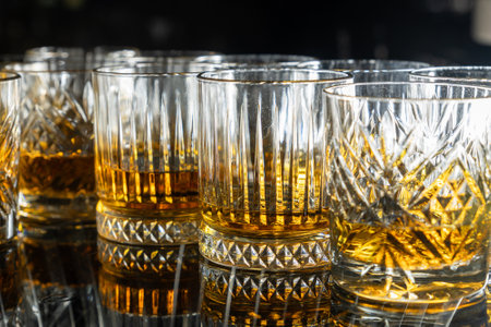 A delicious elite alcoholic or non-alcoholic refreshing drink, served in clear glasses on a buffet tableの写真素材