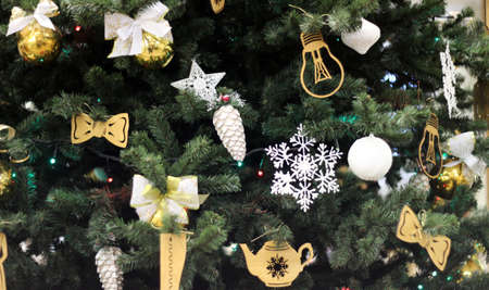 Christmas tree with decorations bols, New year balloons, butterflies, snowflakesの写真素材