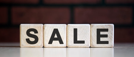 SALE concept using wooden block, business concept.