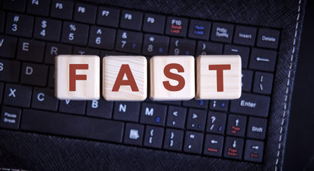FAST word concept on cubes on the keyboardの写真素材