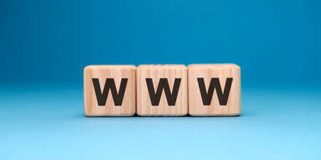 WWW website - text concept on wooden cubes with gradient blue backgroundの写真素材