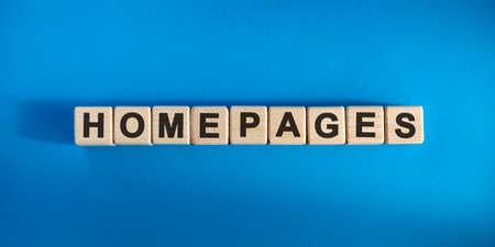 Homepages - conceptual text with wooden cubes on a dark blue backgroundの写真素材