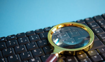 The concept of calculating taxes, financial calculations on the computer, magnifying glass for...