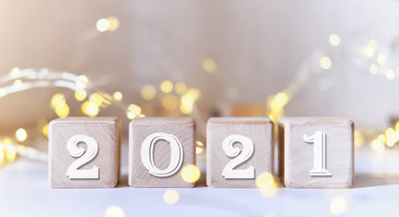 New year 2020 on wooden cubes. Star lights