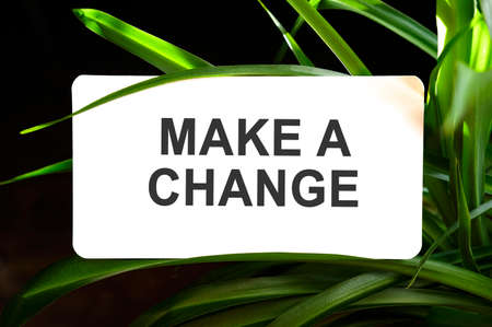 Make a change text on white surrounded by green leavesの写真素材