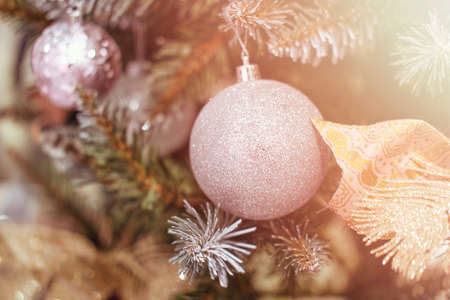 Christmas tree, evergreen Christmas tree with decorative toys wiht selective focusの写真素材