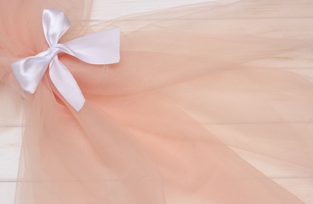 Beautiful layers of gentle pink background with tulle fabric clothesの写真素材