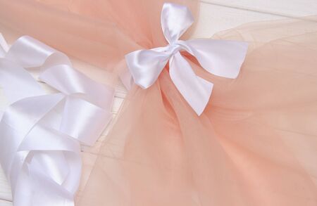 Beautiful layers of gentle pink background with tulle fabric clothesの写真素材