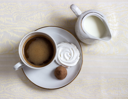 coffee with cream and meringue candy truffleの写真素材