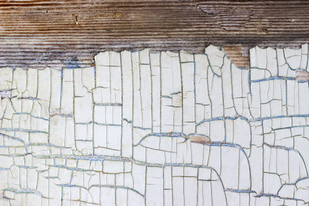 old wooden background with cracked paint white