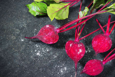 Fresh beets on a black background for frying in the panの写真素材