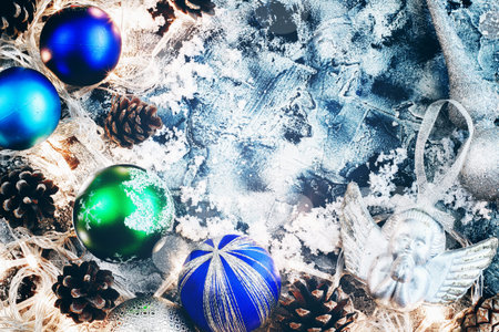 New Years composition of balls, cones and snow with a place for text. Vintage style. toningの写真素材
