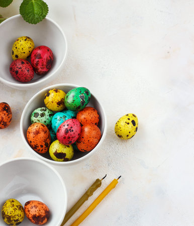 Colored easter eggs on a light background,place for text.の写真素材