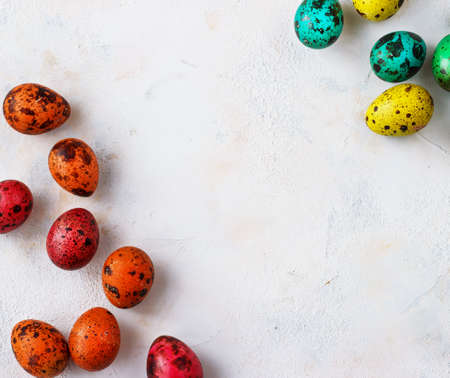 Colored easter eggs on a light background,place for text.の写真素材