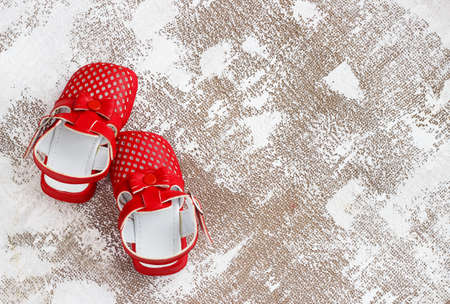 Children's shoes on a light backgroundの写真素材