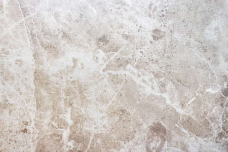 Brown marble texture for design pattern artwork background. The texture of the wall with cracked beige marble background.の写真素材
