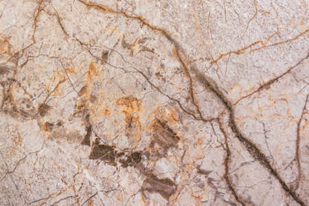 Brown marble texture for design pattern artwork background. The texture of the wall with cracked beige marble background.の写真素材