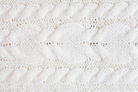Abstract knitted background. Wool white sweater texture. Close up picture of  knitted pattern.の写真素材