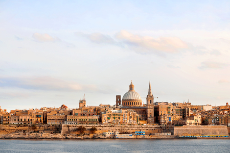 Early winter morning in Valletta, Malta. St.Paul cathedral and other historical buildings.の写真素材