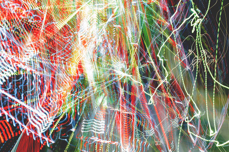 Abstract colorful background. Freezelight effect. Shoot with long exposure. Blurred neon chaotic...
