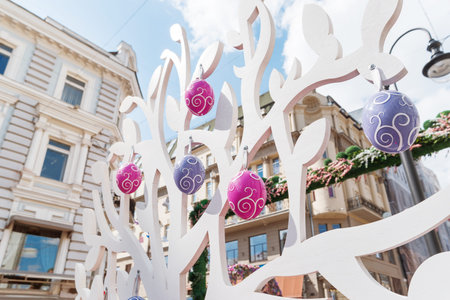 Street festival Moscow Spring. Easter decoration of colorful fair. People walking on sunny day.