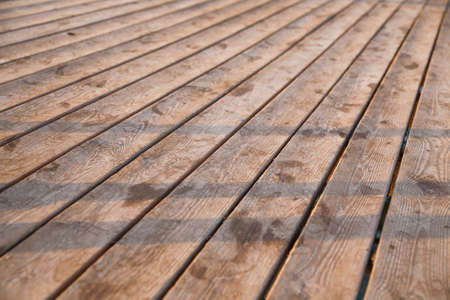 Floor of wooden planks. Natural surface of old boards.の写真素材