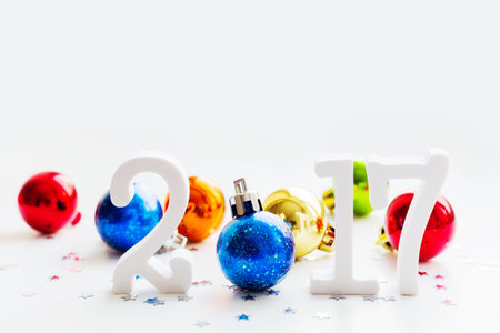 Christmas and New Year 2017 background with colorful decorative balls for Christmas tree. Place for...
