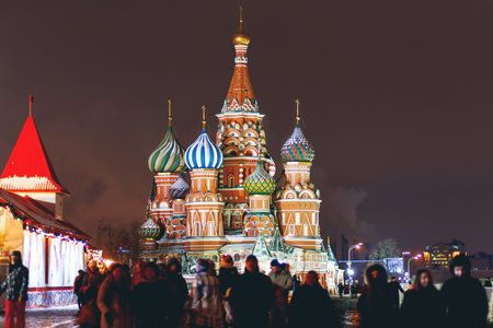 MOSCOW, RUSSIA - January 11, 2017. People walking on Red Square near famous St. Basil's Cathedral....