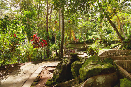 Pond with lotuses in Goagajah Temple (Elephant Cave Temple). Ubud, Bali island, Indonesia.
