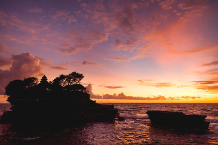 Sunset at Tanah Lot temple. Bali island, Indonesia.の写真素材