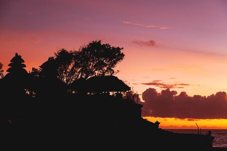 Sunset at Tanah Lot temple. Bali island, Indonesia.の写真素材