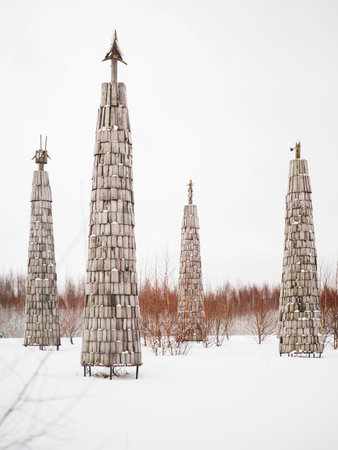NIKOLA-LENIVETS, RUSSIA - January 15, 2017. Wooden artobject, exhibit of architectural festival "Archstoyanie". Winter cloudy day.のeditorial素材
