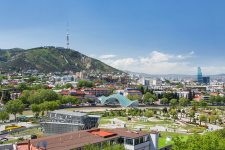 Panorama view of Tbilisi. Famous modern landmarks -  Rike park and Bridge of Peace. Georgia country.のeditorial素材