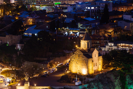 Night aerial view on Metekhi Church of the Dormition of the virgin.Monument to Vakhtang I Gorgasali. Famous landmarks in Tbilisi, Georgia.の写真素材