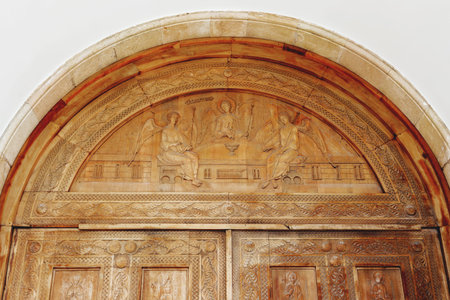 Wooden carved door of The Holy Trinity Cathedral of Tbilisi (commonly known as Sameba), Georgia country.の写真素材