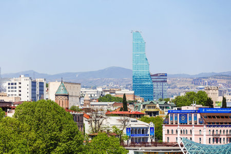 TBILISI, GEORGIA - May 01, 2017. Panorama view of Tbilisi. Modern landmark - Biltmore Hotel Tbilisi.のeditorial素材