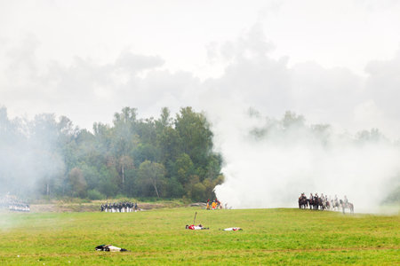 BORODINO, RUSSIA - September 06, 2015 - Reenactment of the battle of Borodino (the Patriotic war of 1812 year). Tourists watch the performance from from the fenced places. Moscow region, Russia.のeditorial素材