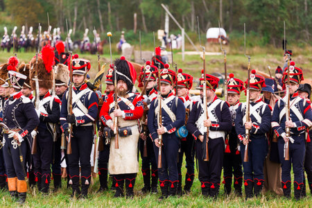 BORODINO, RUSSIA - September 06, 2015 - Reenactment of the battle of Borodino (the Patriotic war of 1812 year). Tourists watch the performance from from the fenced places. Moscow region, Russia.のeditorial素材
