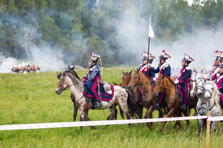 BORODINO, RUSSIA - September 02, 2017 - Reenactment of the battle of Borodino (the Patriotic war of 1812 year). Tourists watch the performance from from the fenced places. Moscow region, Russia.のeditorial素材