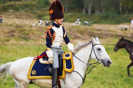 BORODINO, RUSSIA - September 02, 2017 - Reenactment of the battle of Borodino (the Patriotic war of 1812 year). Tourists watch the performance from from the fenced places. Moscow region, Russia.のeditorial素材