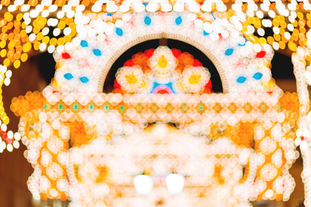 Streets of Moscow decorated for New Year and Christmas celebration. Buildings with light bulbs. Russia.の写真素材